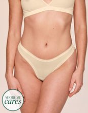 Load image into Gallery viewer, nueskin Bonnie Mesh Low-Rise Thong in color Dawn and shape thong
